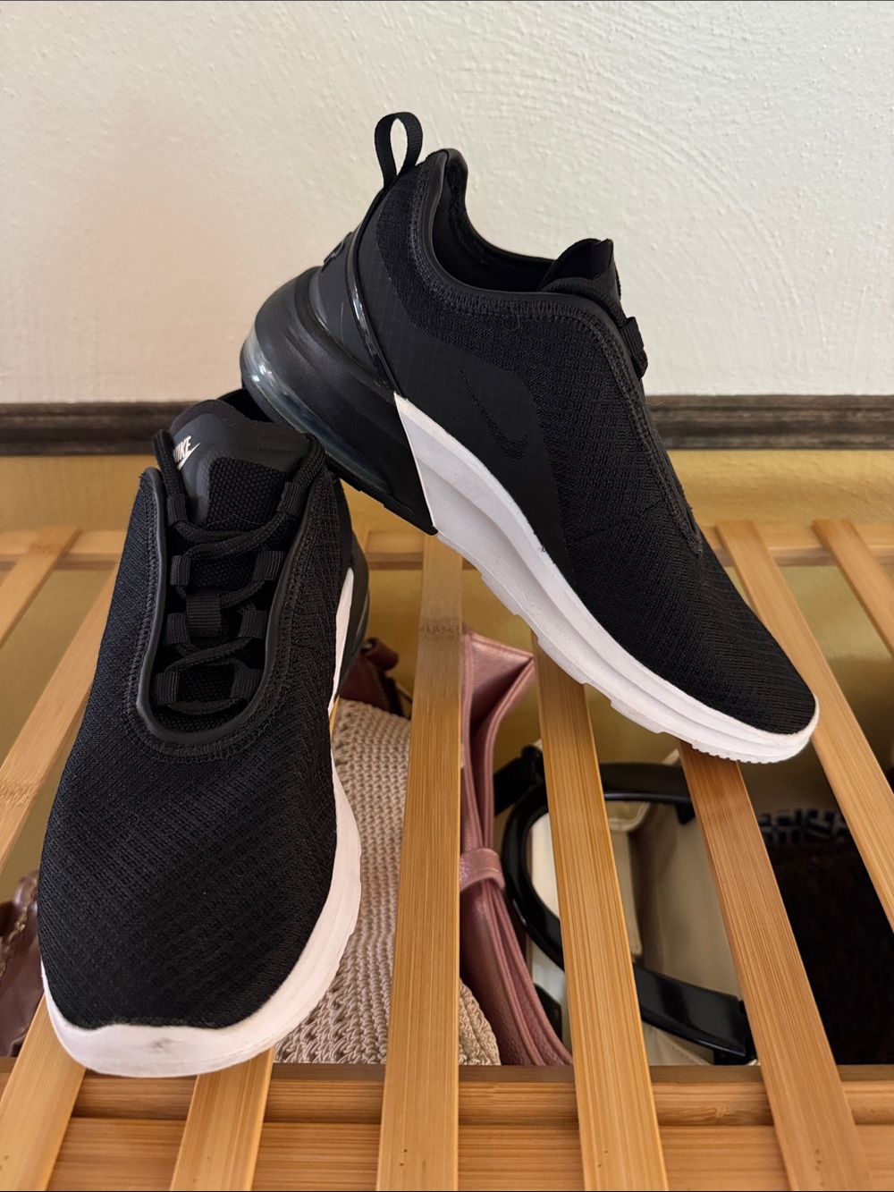Nike Women's Black and White Slip-On Knit Sneakers